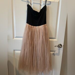 Straplesss black top and champagne tulle dress